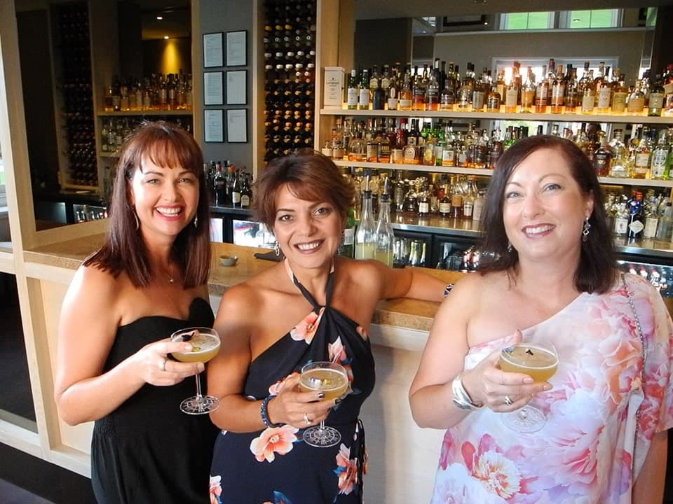 Guests enjoying drinks on a Perth cocktail walking tour